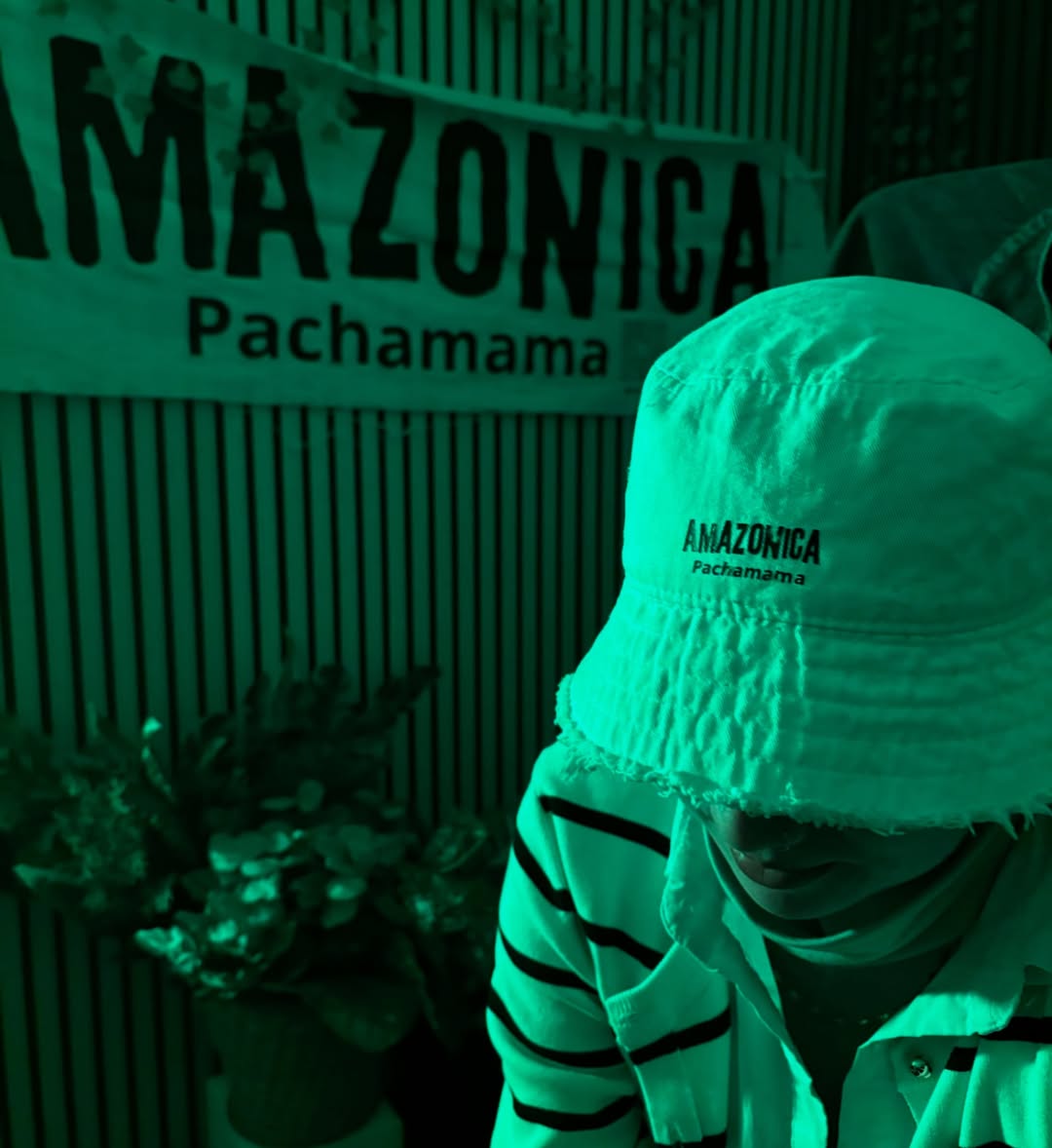 Amazonica branded apparel photographed in the studio with green lighting